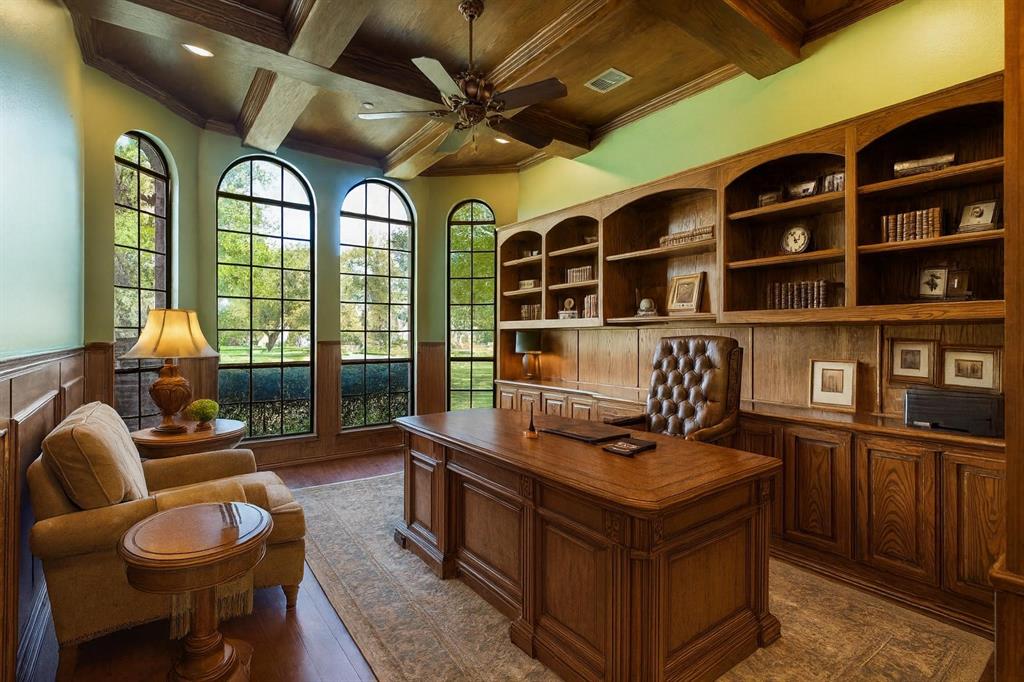 1000 Saddlebrook Drive Lucas, TX 75002 - Photo 11 of 39 Home office featuring coffered ceiling, ornamental molding, a ceiling fan, a wood ceiling with exposed beams, and a wainscoted wall