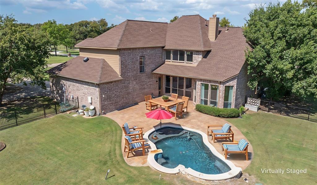 1000 Saddlebrook Drive Lucas, TX 75002 - Photo 2 of 39 View of pool with a fenced backyard, a patio, outdoor dining area