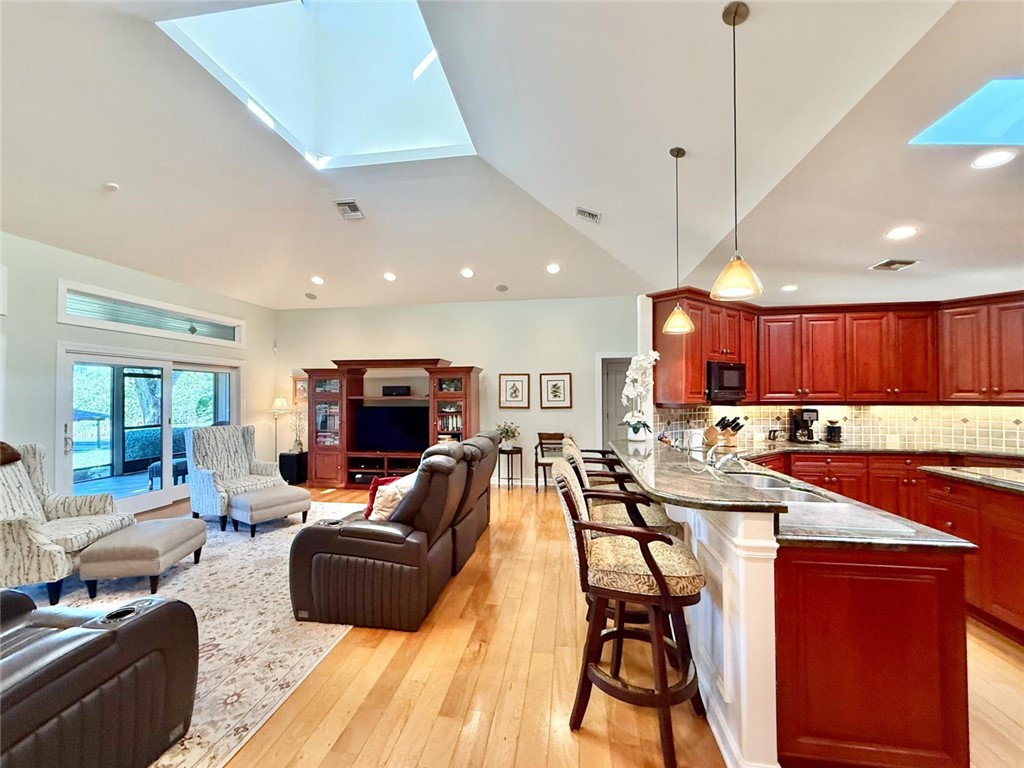 869 Robin Lane Sebastian, FL 32958 - Photo 23 of 35 a living room with stainless steel appliances kitchen view and a large window