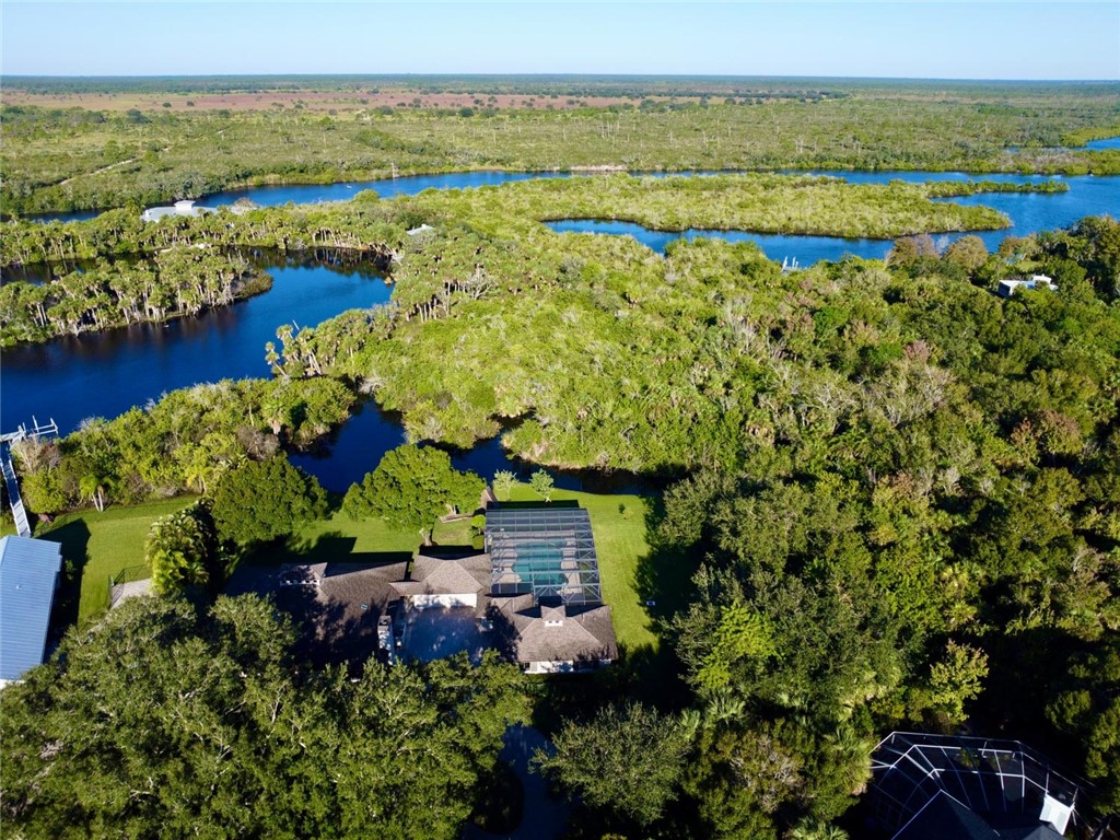 869 Robin Lane Sebastian, FL 32958 - Photo 33 of 35 a view of lake with beach