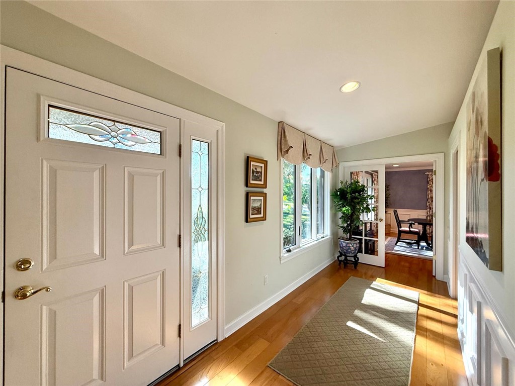 869 Robin Lane Sebastian, FL 32958 - Photo 5 of 35 a lobby with furniture and floor to ceiling window