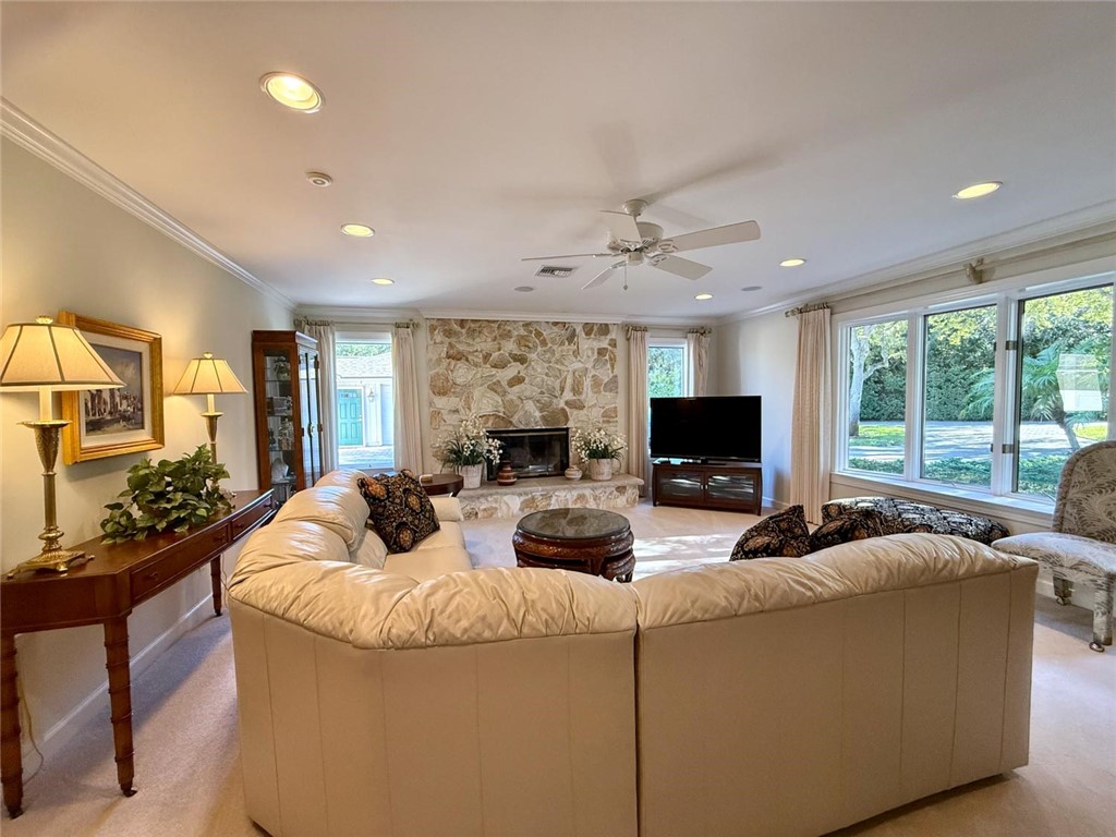 869 Robin Lane Sebastian, FL 32958 - Photo 6 of 35 a living room with furniture and a flat screen tv