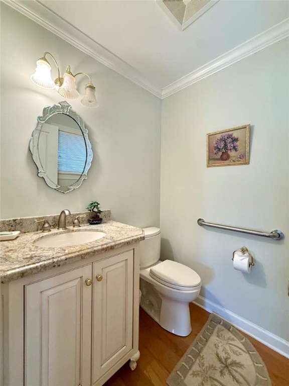 869 Robin Lane Sebastian, FL 32958 - Photo 9 of 35 a bathroom with a toilet sink and mirror