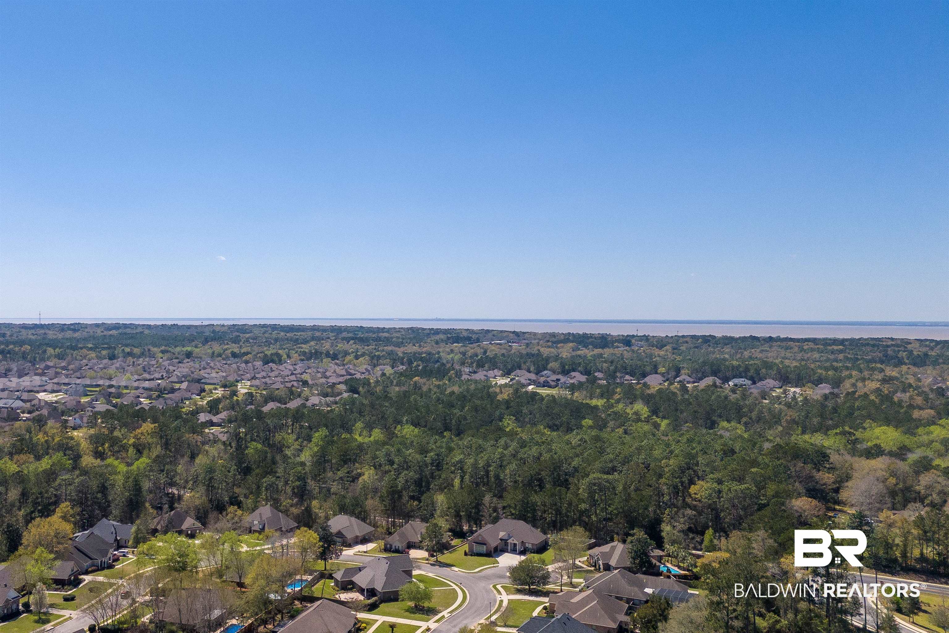 27888 Oakachoy Loop Daphne, AL 36526 - Photo 63 of 65 Aerial view with a residential view, a water view, and a wooded view