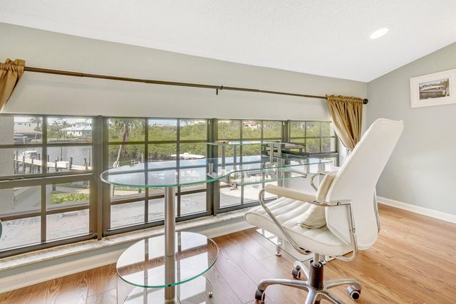 $660,000 | 2299 Treasure Isle Drive, Unit 59, Palm Beach Gardens, FL 33410