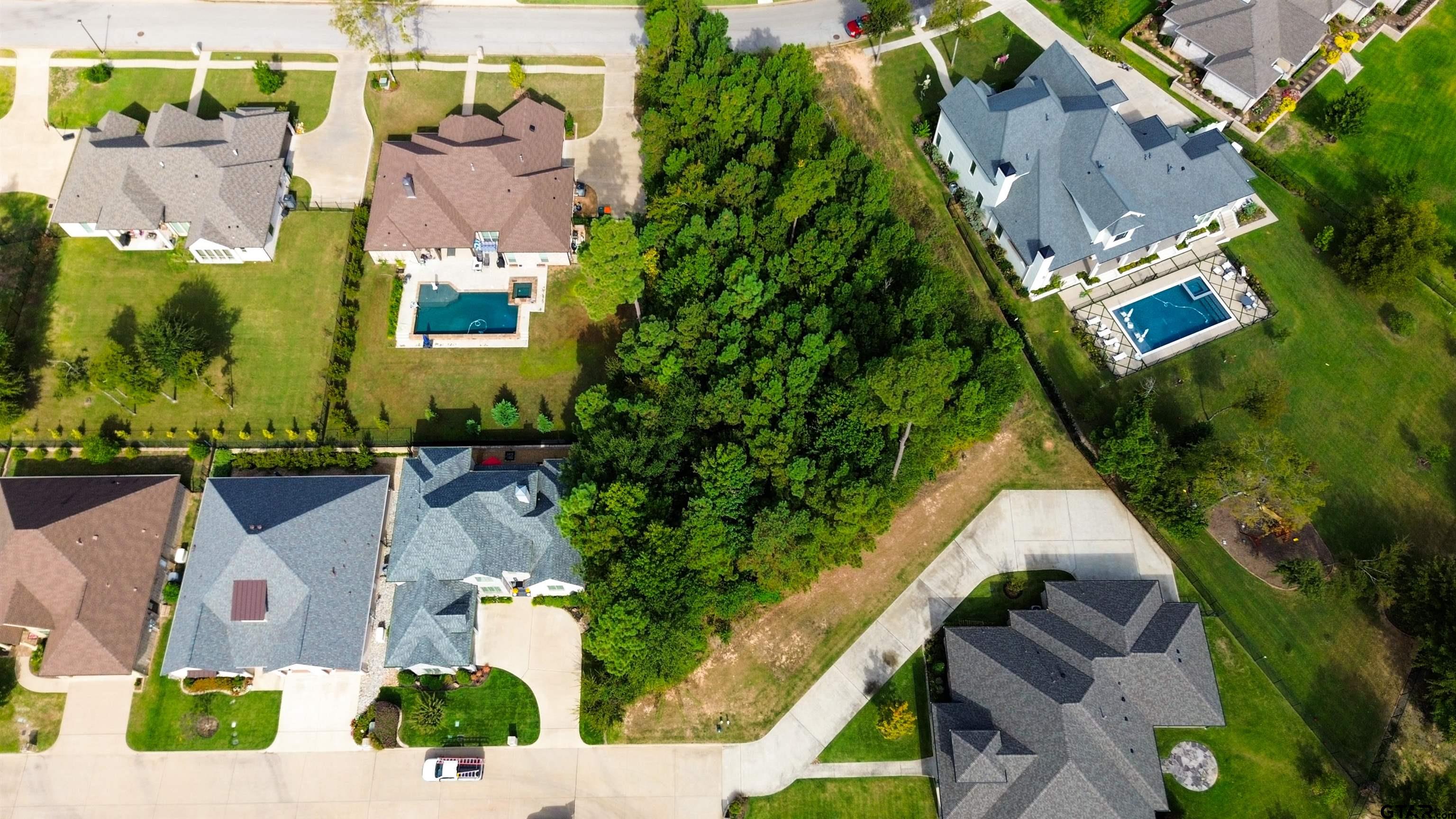 7535 Cross Gate Way Tyler, TX 75703 - Photo 3 of 17 an aerial view of residential houses with outdoor space