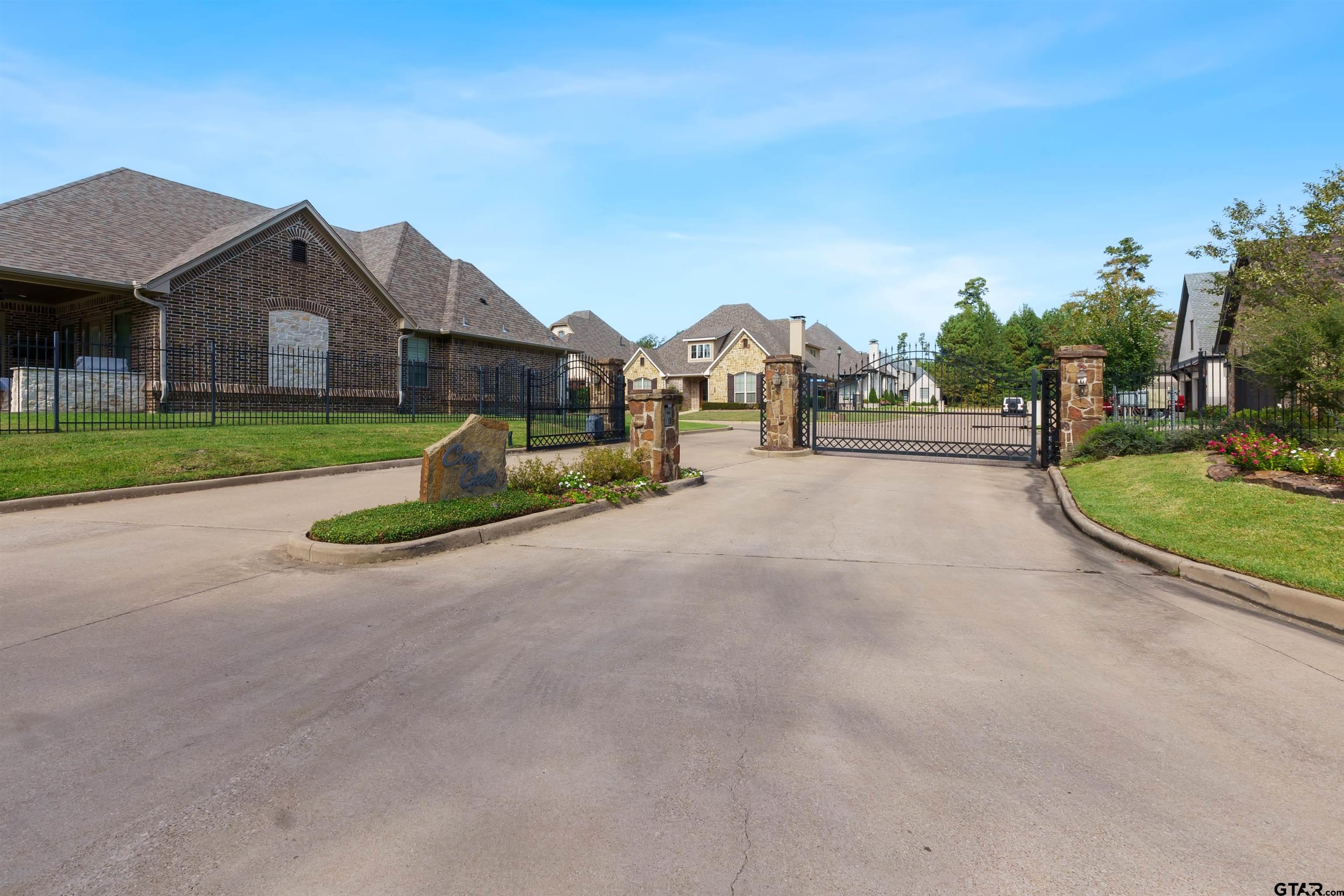 7535 Cross Gate Way Tyler, TX 75703 - Photo 4 of 17 a view of a house with a yard and large tree