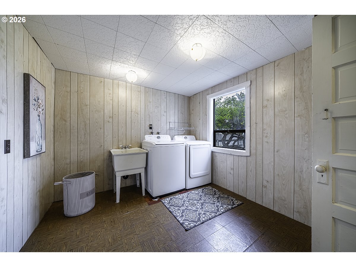 408 Oak Grove Road Medford, OR 97501 - Photo 21 of 46 a room with furniture a window and a chandelier