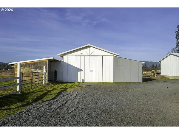 a view of a backyard with a house