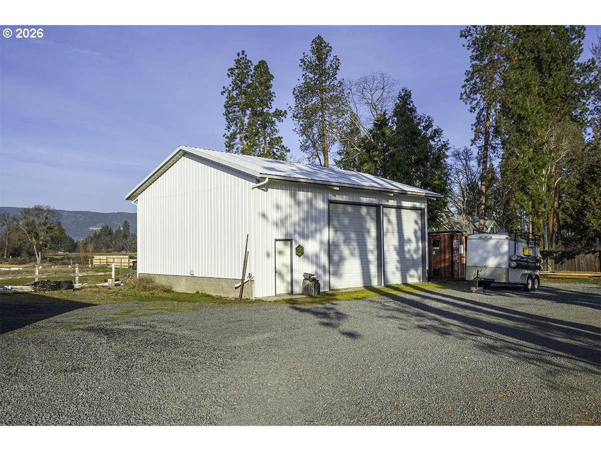 408 Oak Grove Road Medford, OR 97501 - Photo 32 of 46 a view of a house with a yard
