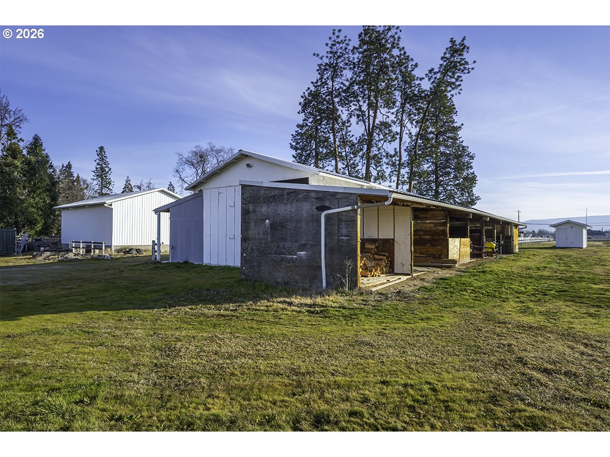 408 Oak Grove Road Medford, OR 97501 - Photo 37 of 46 a front view of a house with a garden