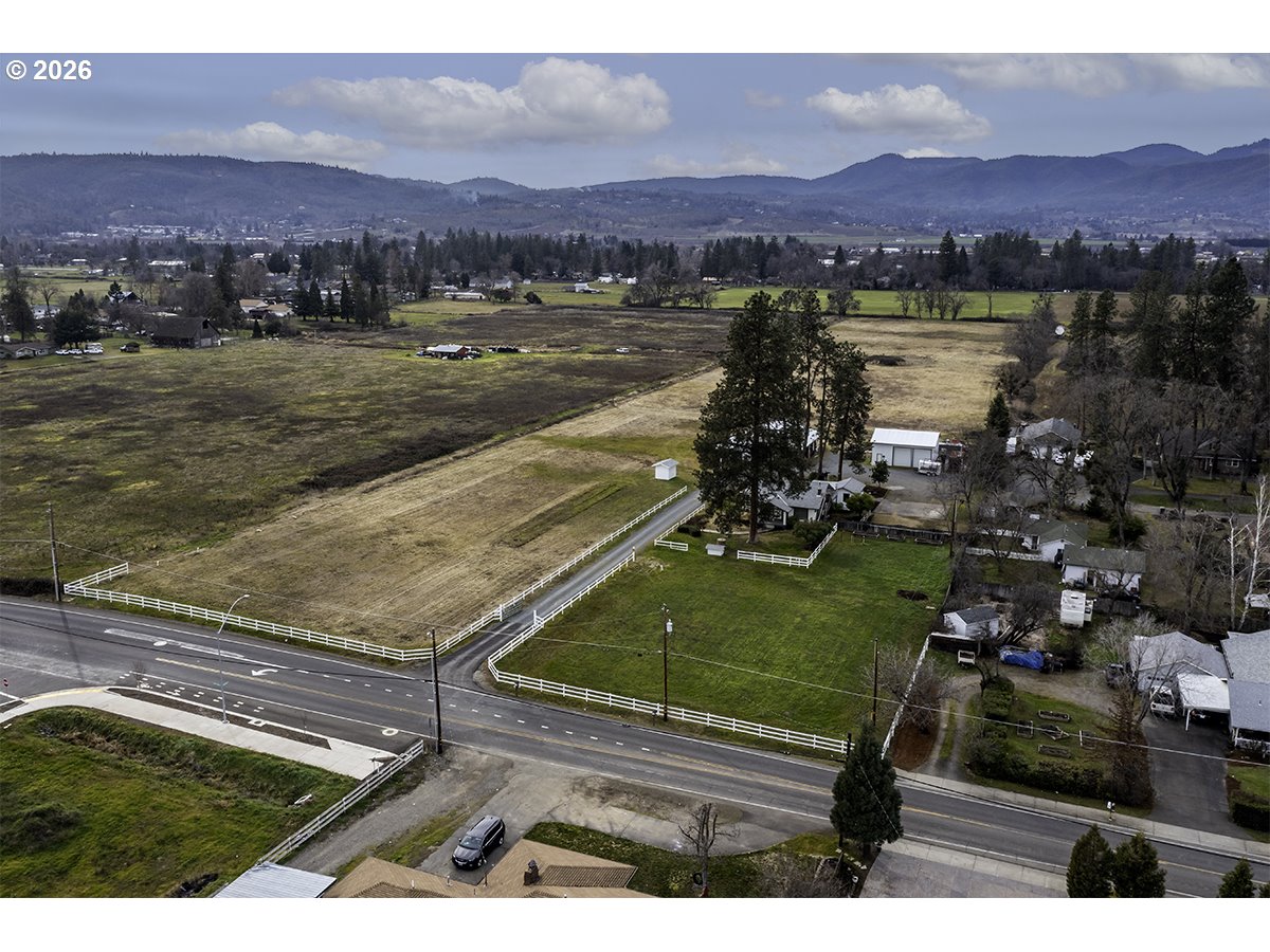 408 Oak Grove Road Medford, OR 97501 - Photo 5 of 46 a view of a city with a lake