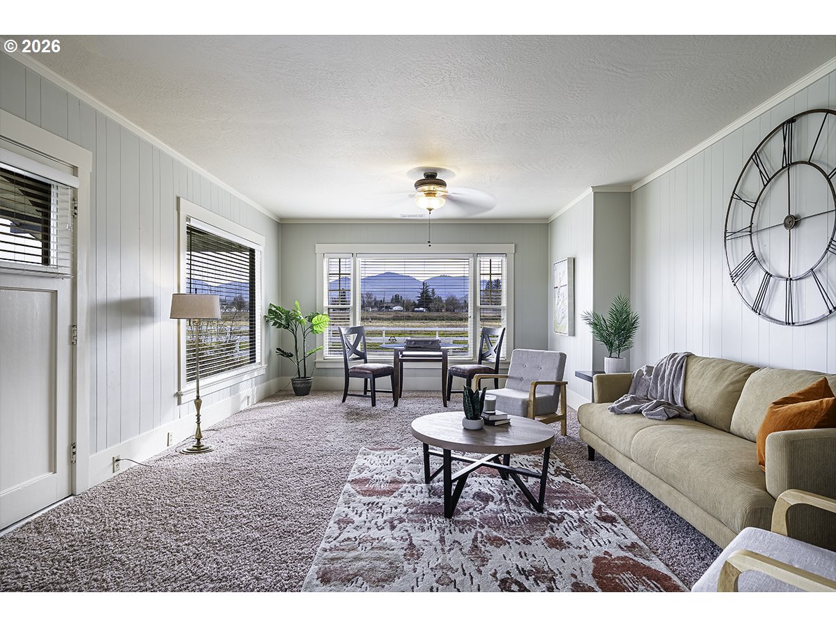 408 Oak Grove Road Medford, OR 97501 - Photo 10 of 46 a living room with furniture and a window