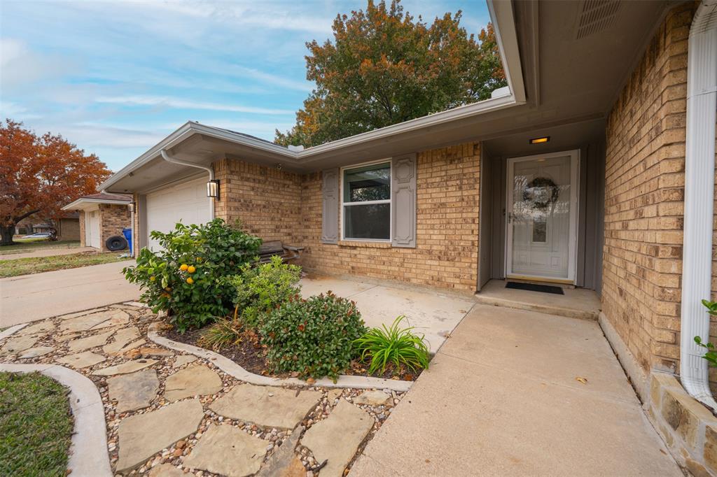 1205 Clover Hill Road Mansfield, TX 76063 - Photo 2 of 29 Front porch with lemon tree