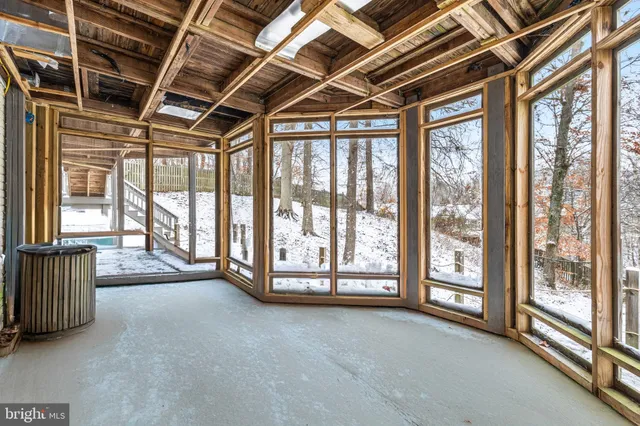 a view of an empty room with a balcony