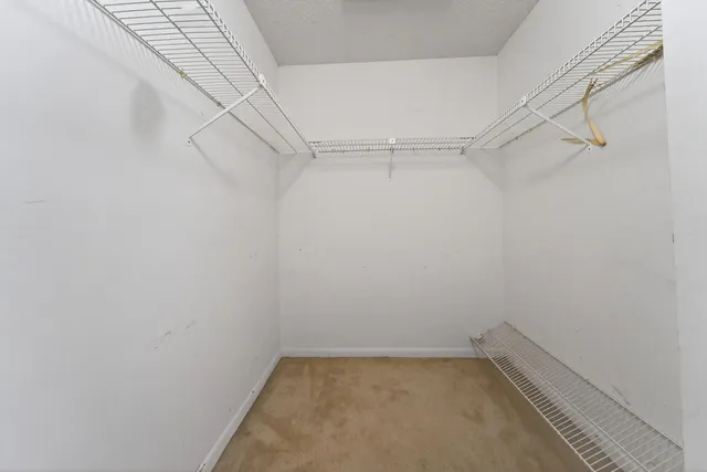 a view of a room with racks on the wall