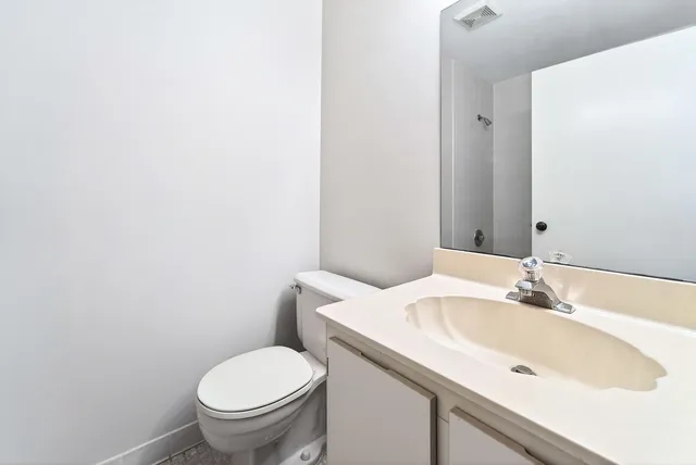 a bathroom with a sink and a toilet
