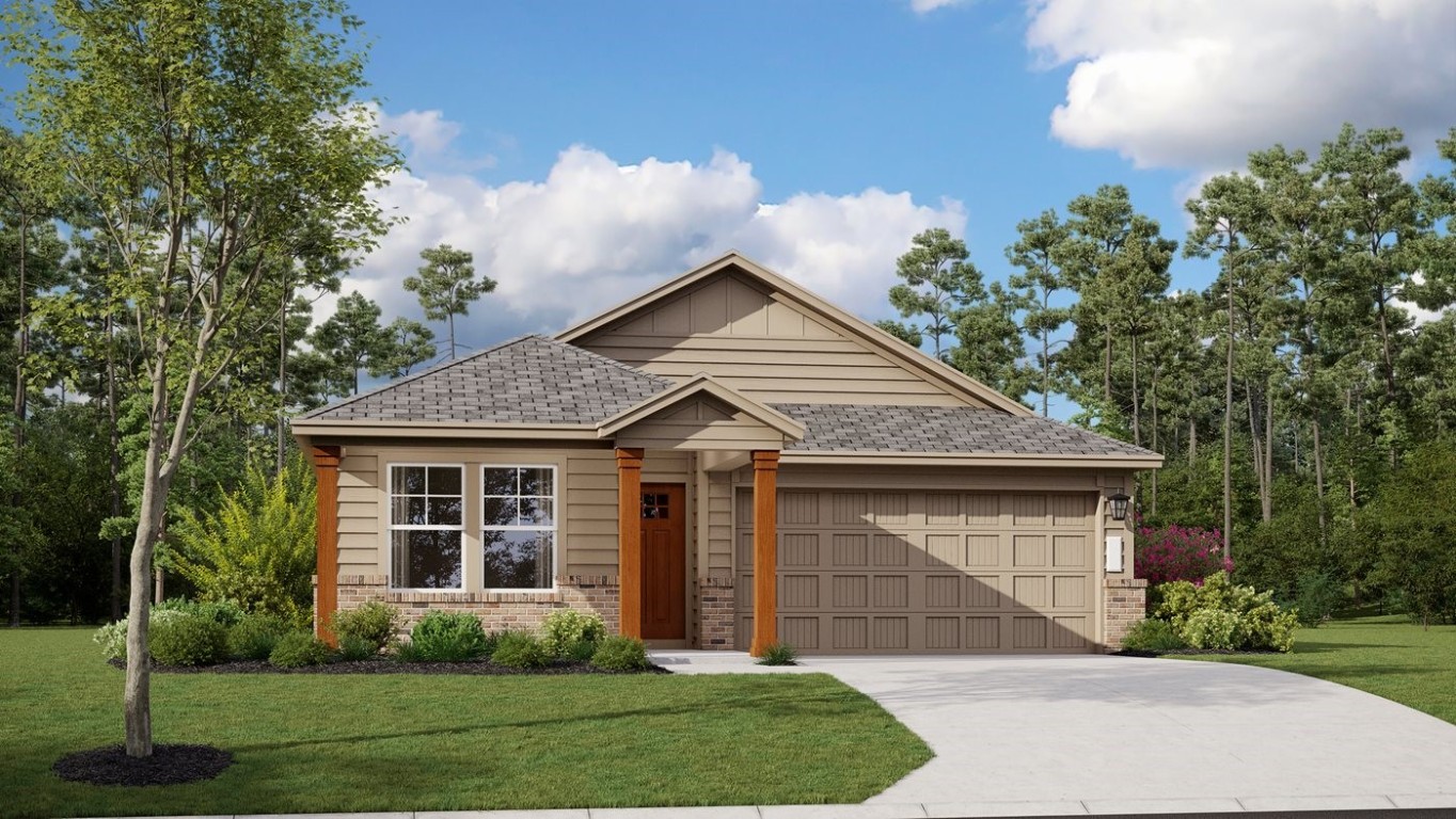 163 Yuba Path Kyle, TX 78640 - Photo 1 of 1 a front view of a house with a garden
