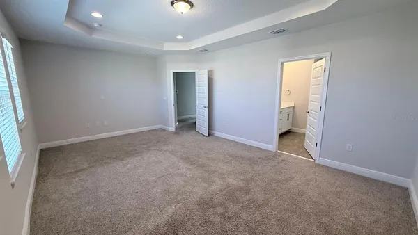 a bathroom with a double vanity sink and mirror