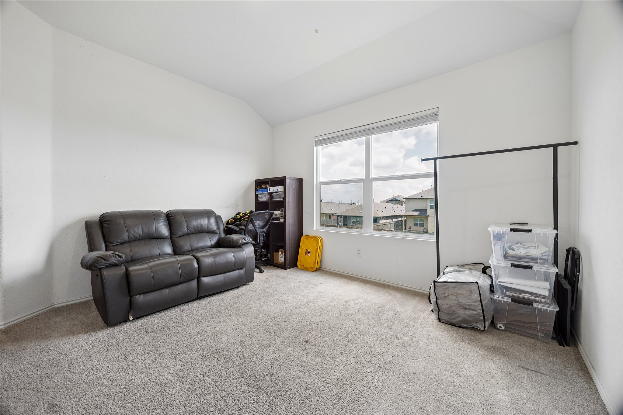 217 Canley Loop Hutto, TX 78634 - Photo 25 of 36 A quiet loft space offers views of the surrounding neighborhood through generous windows.