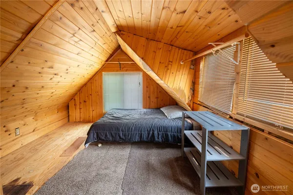 a view of a house with a bed