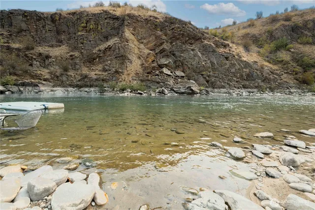 a view of a lake with mountain