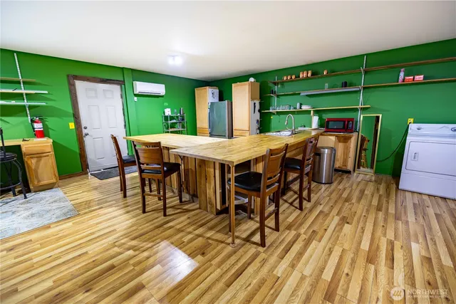 a view of a dinning table and chairs in the patio
