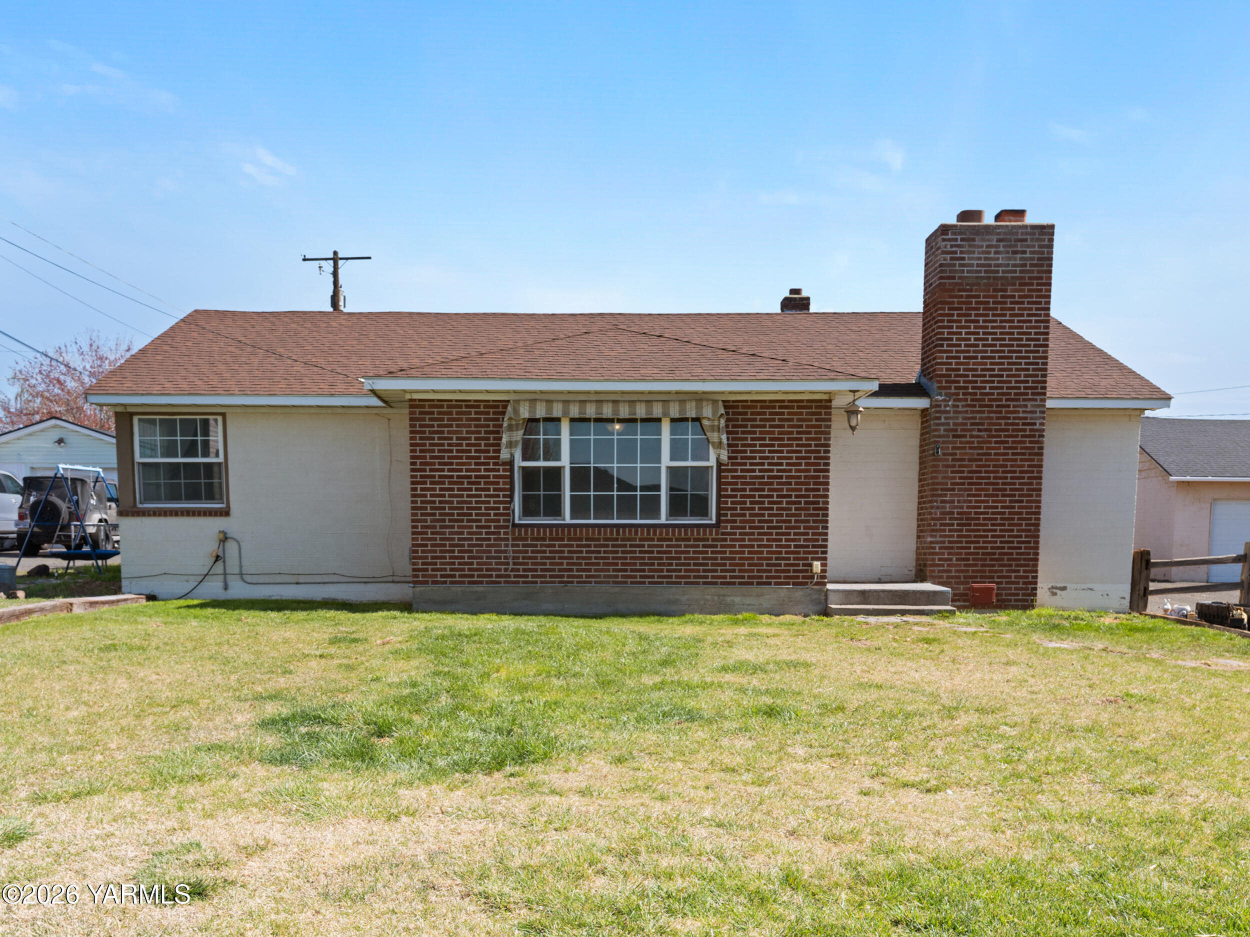 423 South 41st Street Yakima, WA 98901 - Photo 1 of 29 a view of a house with a yard