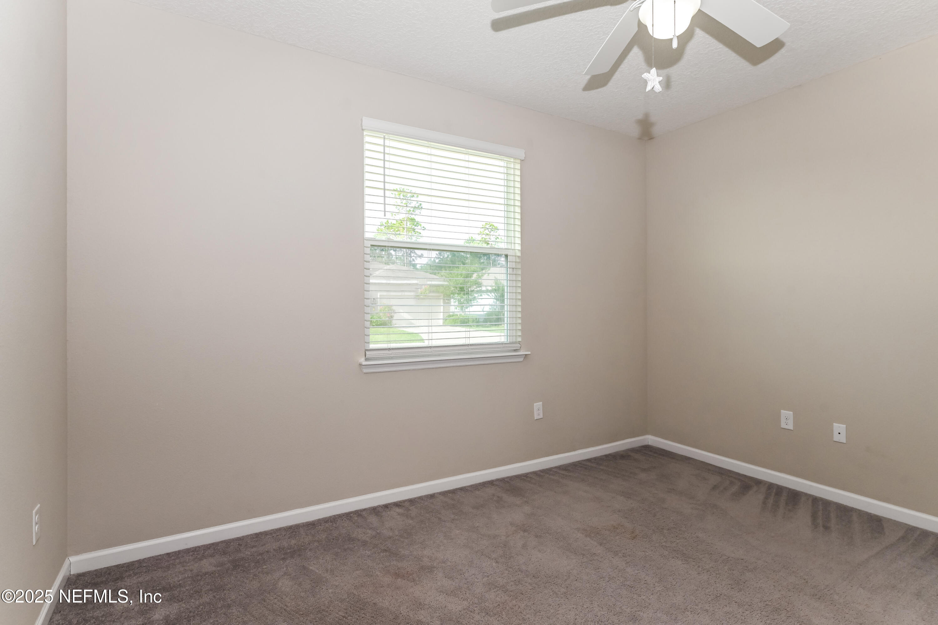 203 Stone Arbor Lane St. Augustine, FL 32086 - Photo 12 of 15 an empty room with a window