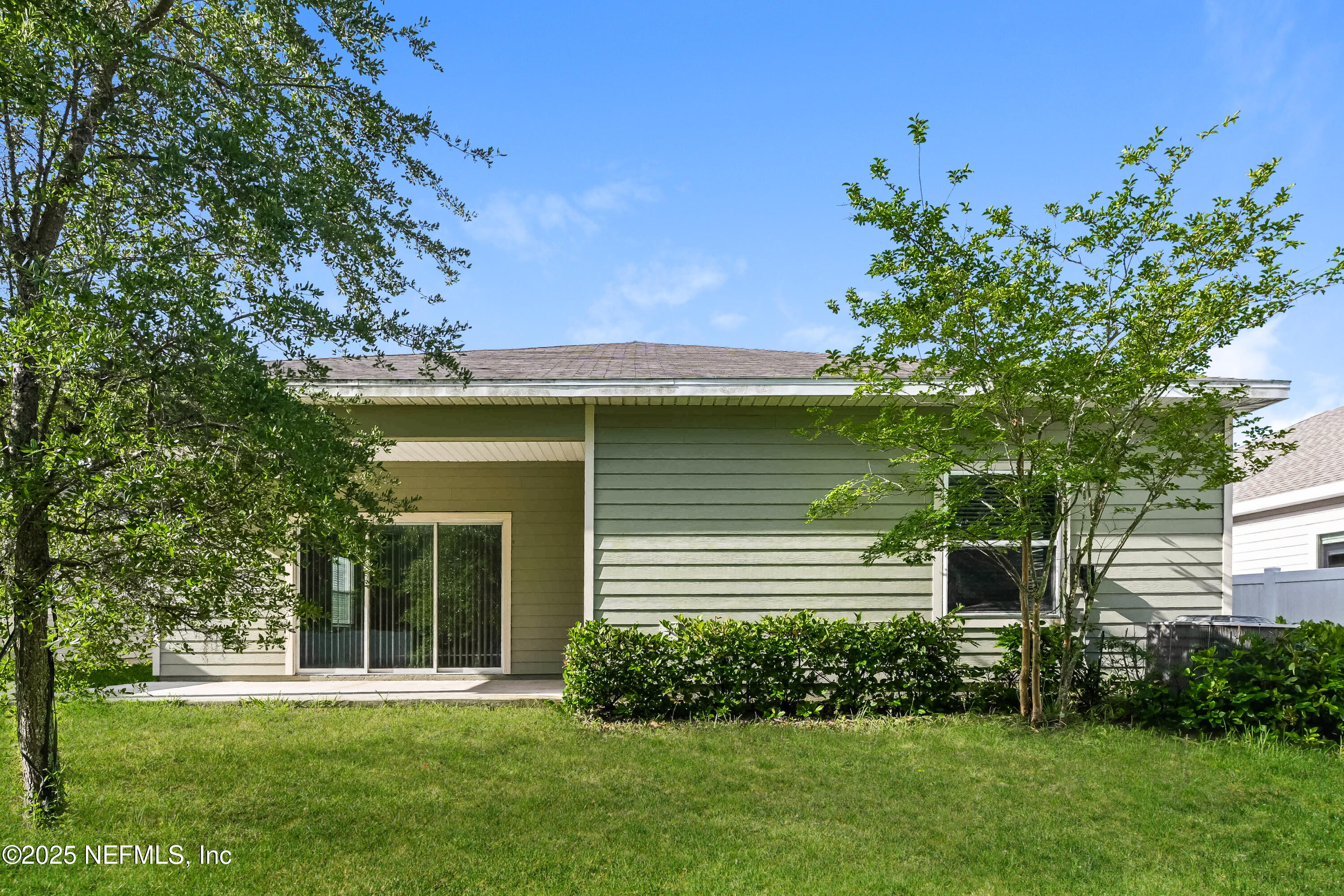 203 Stone Arbor Lane St. Augustine, FL 32086 - Photo 15 of 15 a front view of a house with a yard