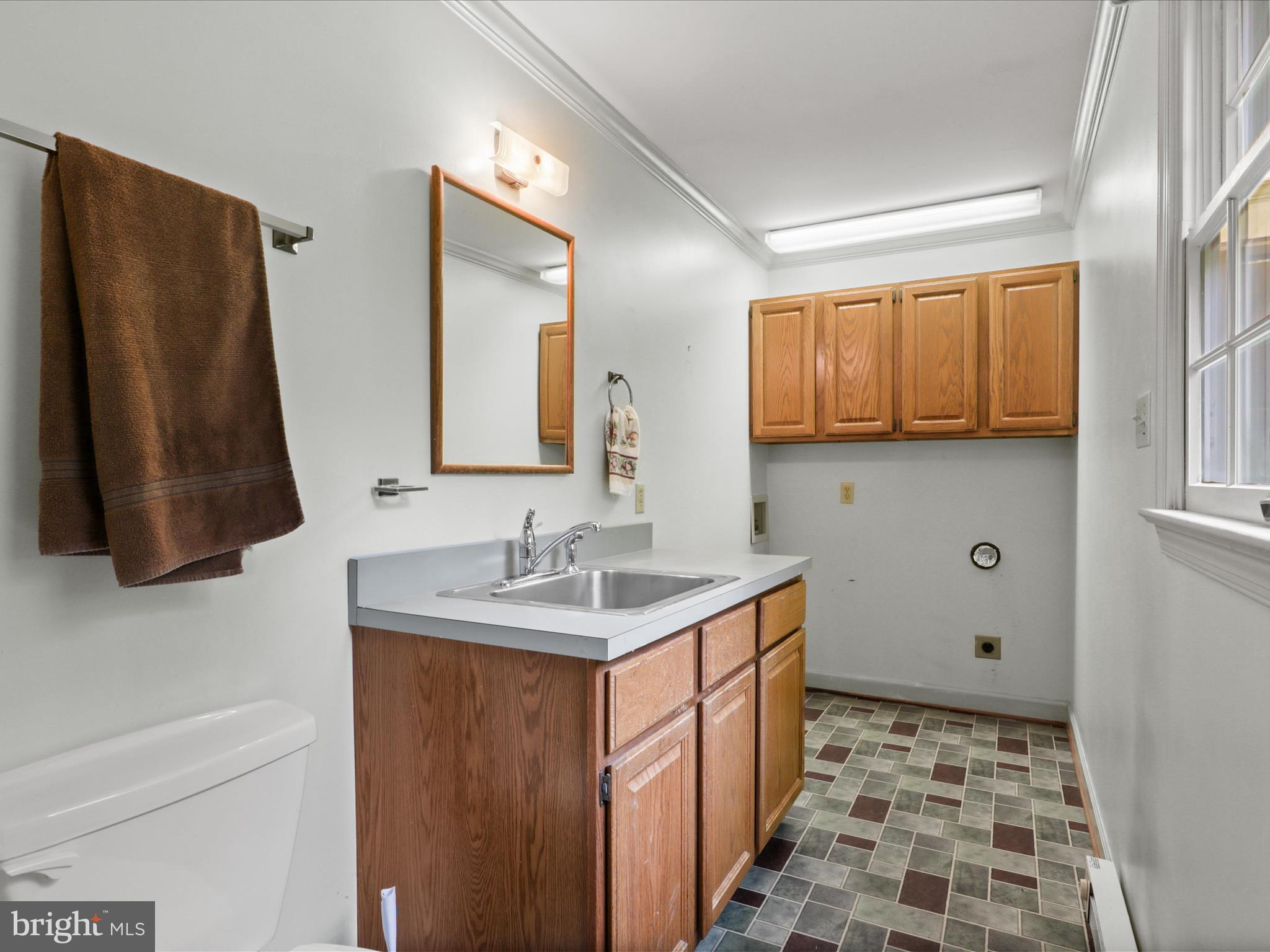 13124 South River Road Sumerduck, VA 22742 - Photo 15 of 54 a bathroom with a sink and a mirror