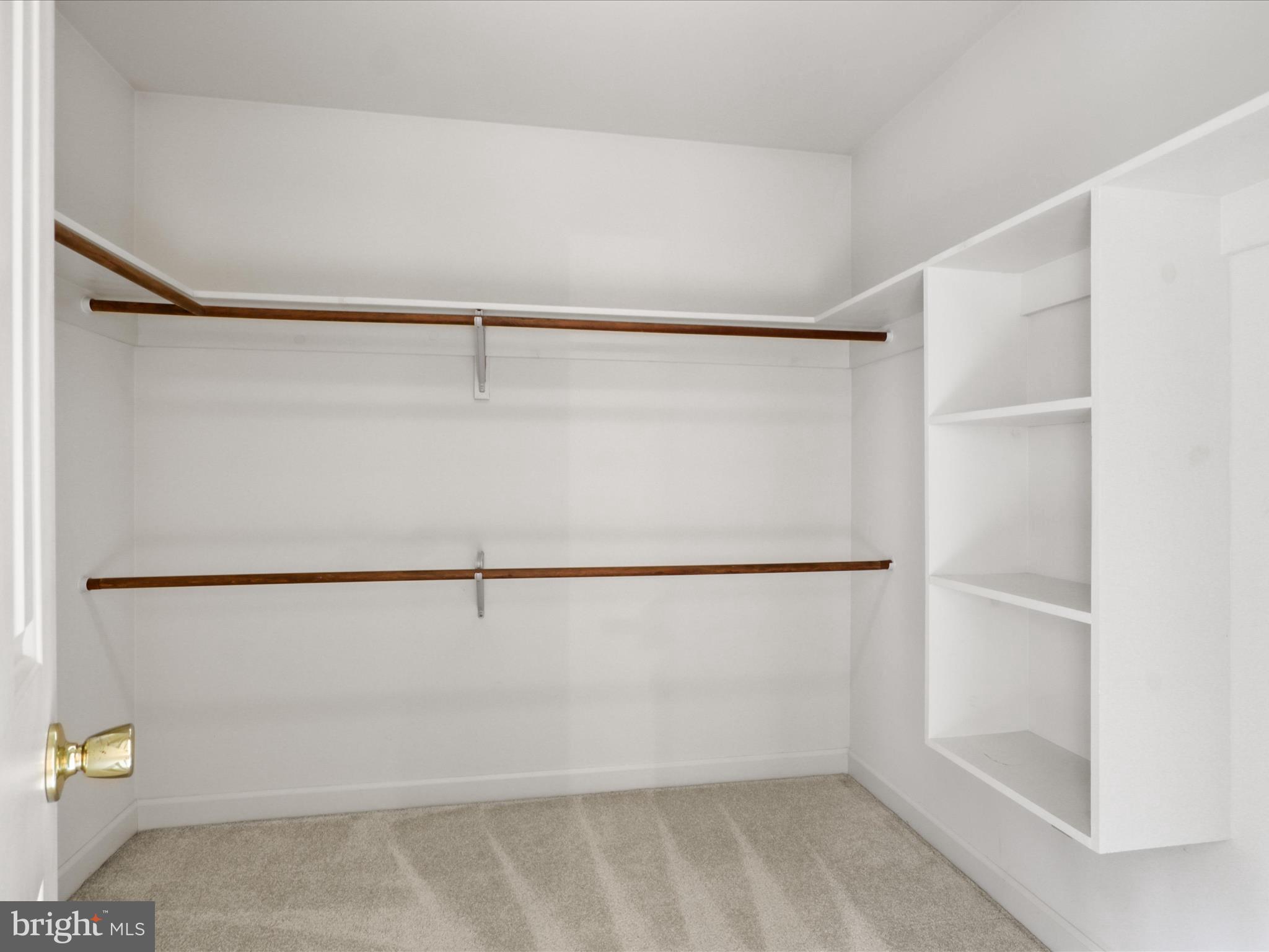 13124 South River Road Sumerduck, VA 22742 - Photo 25 of 54 a view of an empty walk in closet