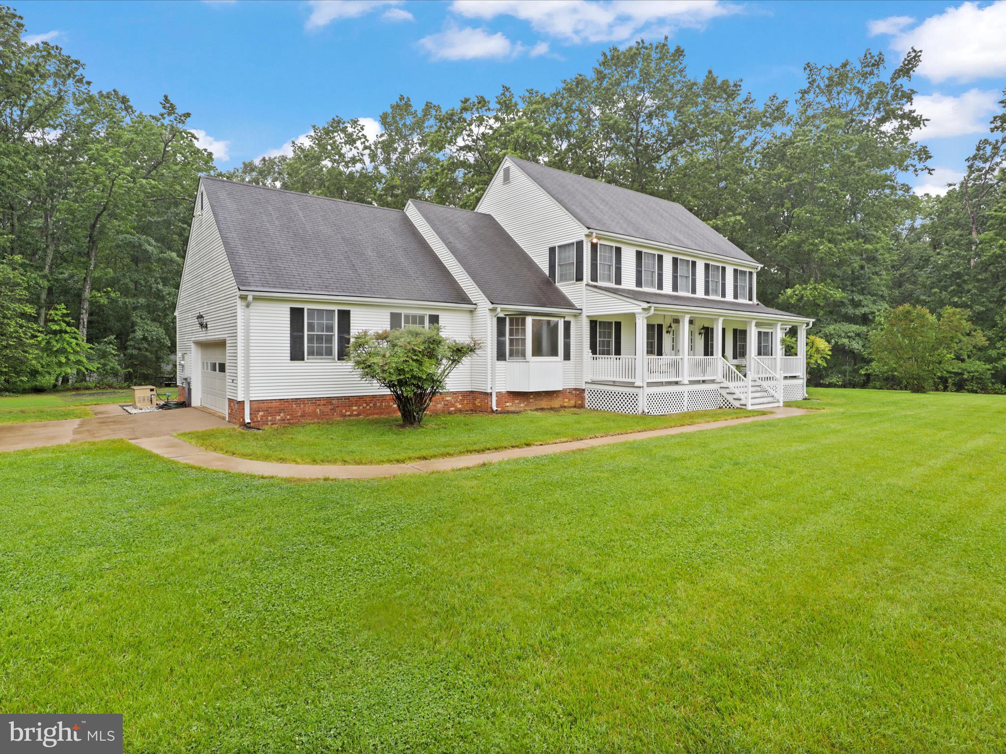 13124 South River Road Sumerduck, VA 22742 - Photo 3 of 54 a front view of house with yard and green space