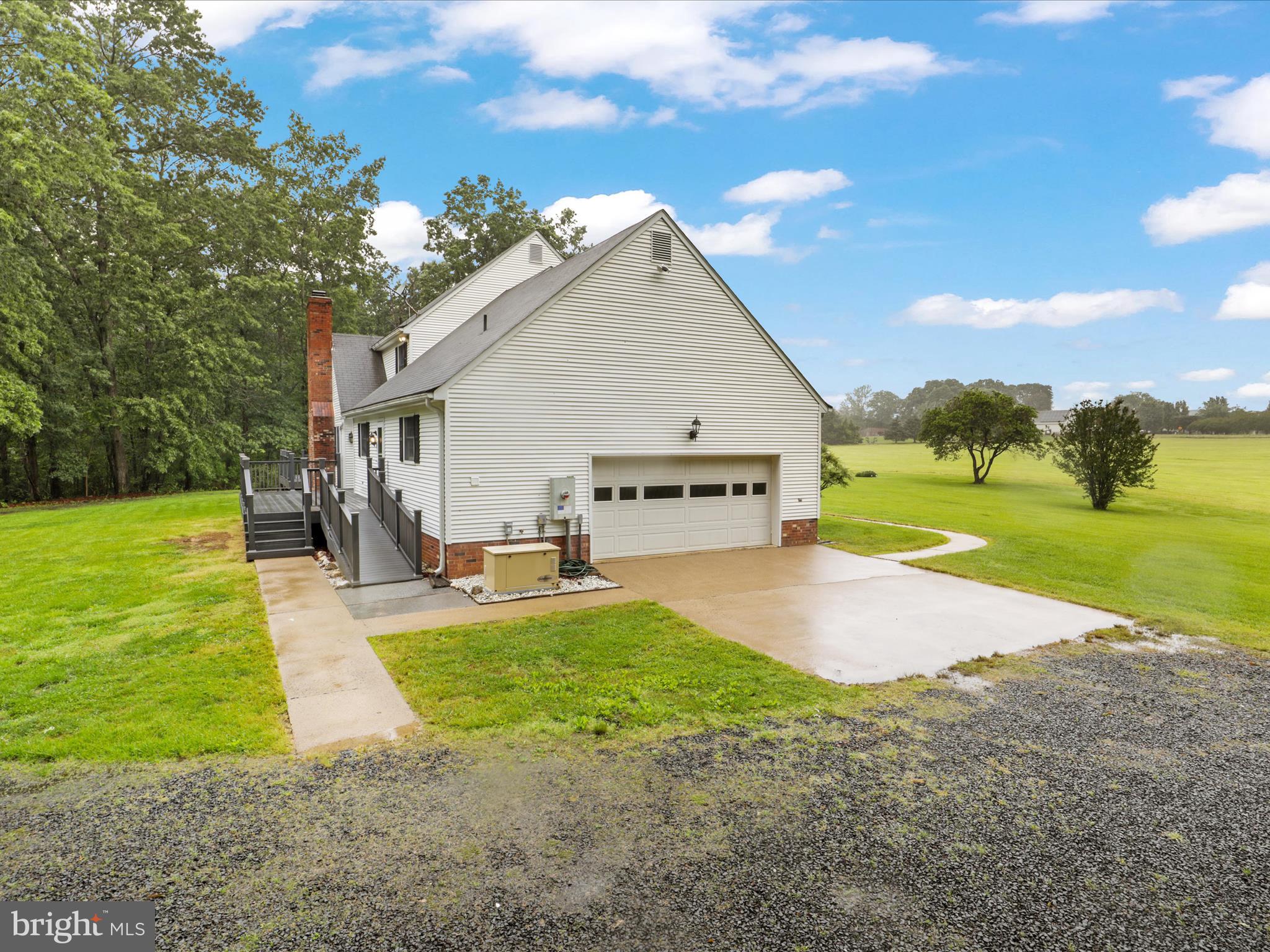 13124 South River Road Sumerduck, VA 22742 - Photo 40 of 54 a view of a house with swimming pool and a yard