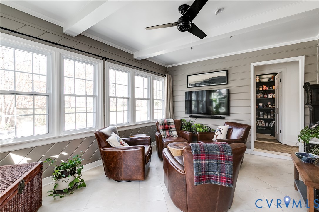 3150 East Brigstock Road Midlothian, VA 23113 - Photo 20 of 50 a living room with furniture and floor to ceiling windows