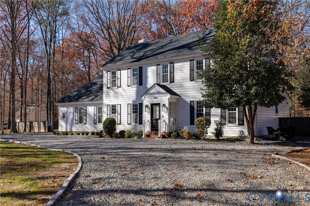 3150 East Brigstock Road Midlothian, VA 23113 - Photo 2 of 50 a front view of a house with a yard