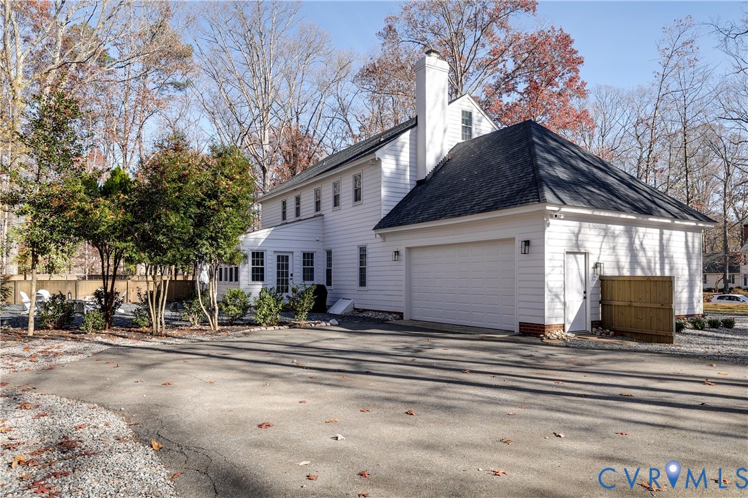 3150 East Brigstock Road Midlothian, VA 23113 - Photo 48 of 50 a view of a house with a yard