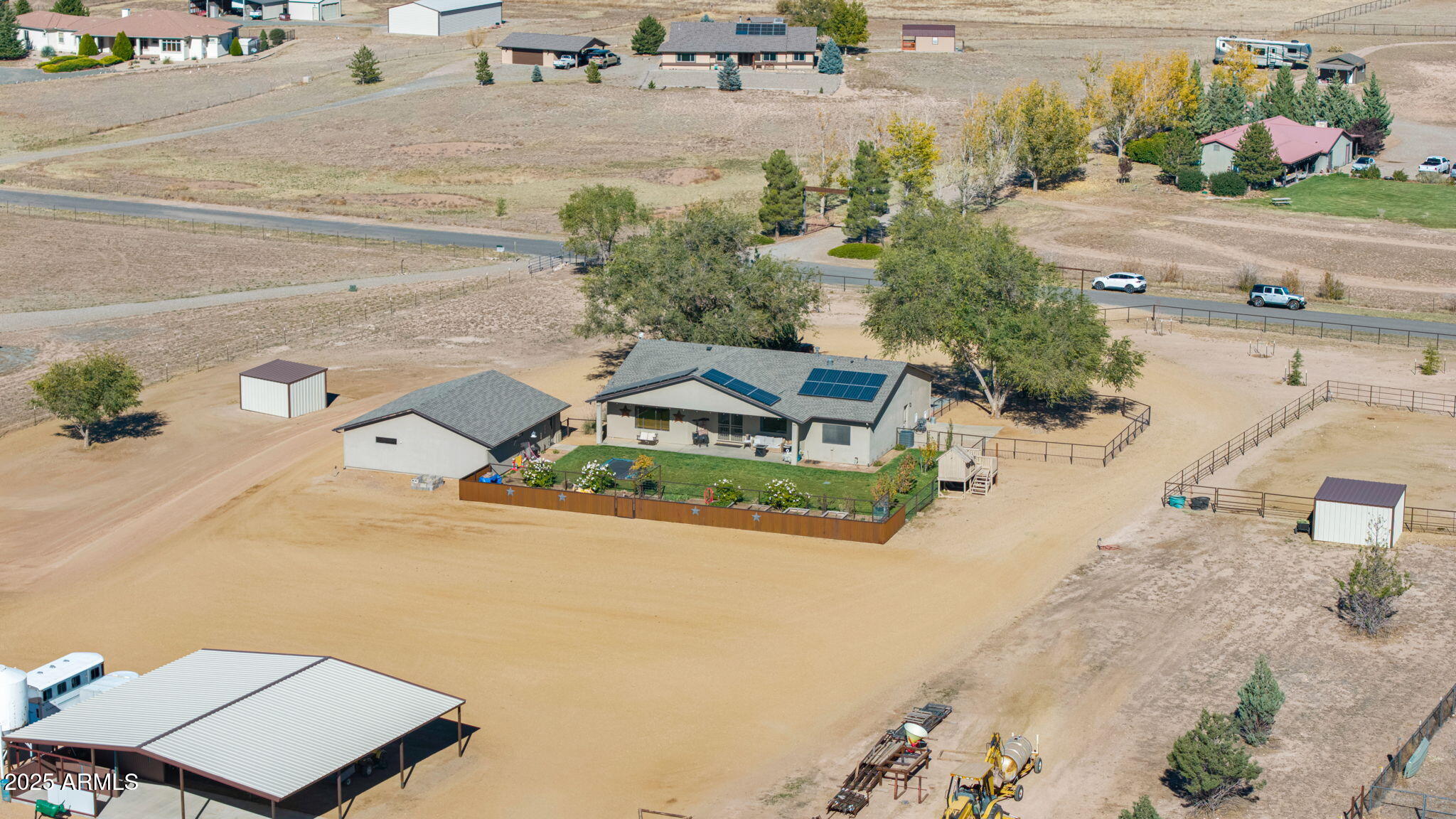 7645 Memory Lane Prescott Valley, AZ 86315 - Photo 18 of 79 an aerial view of a house with a yard and lake view