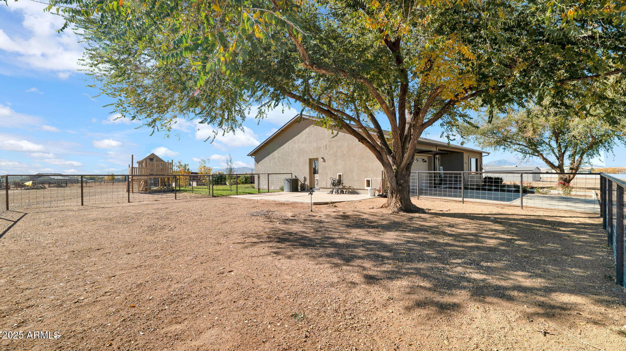 7645 Memory Lane Prescott Valley, AZ 86315 - Photo 28 of 79 a view of white house with a yard