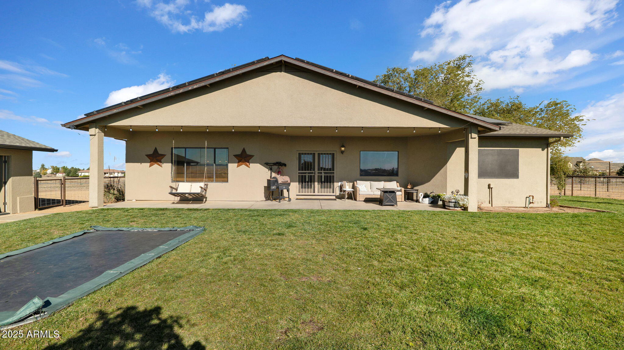 7645 Memory Lane Prescott Valley, AZ 86315 - Photo 45 of 79 a front view of a house with garden