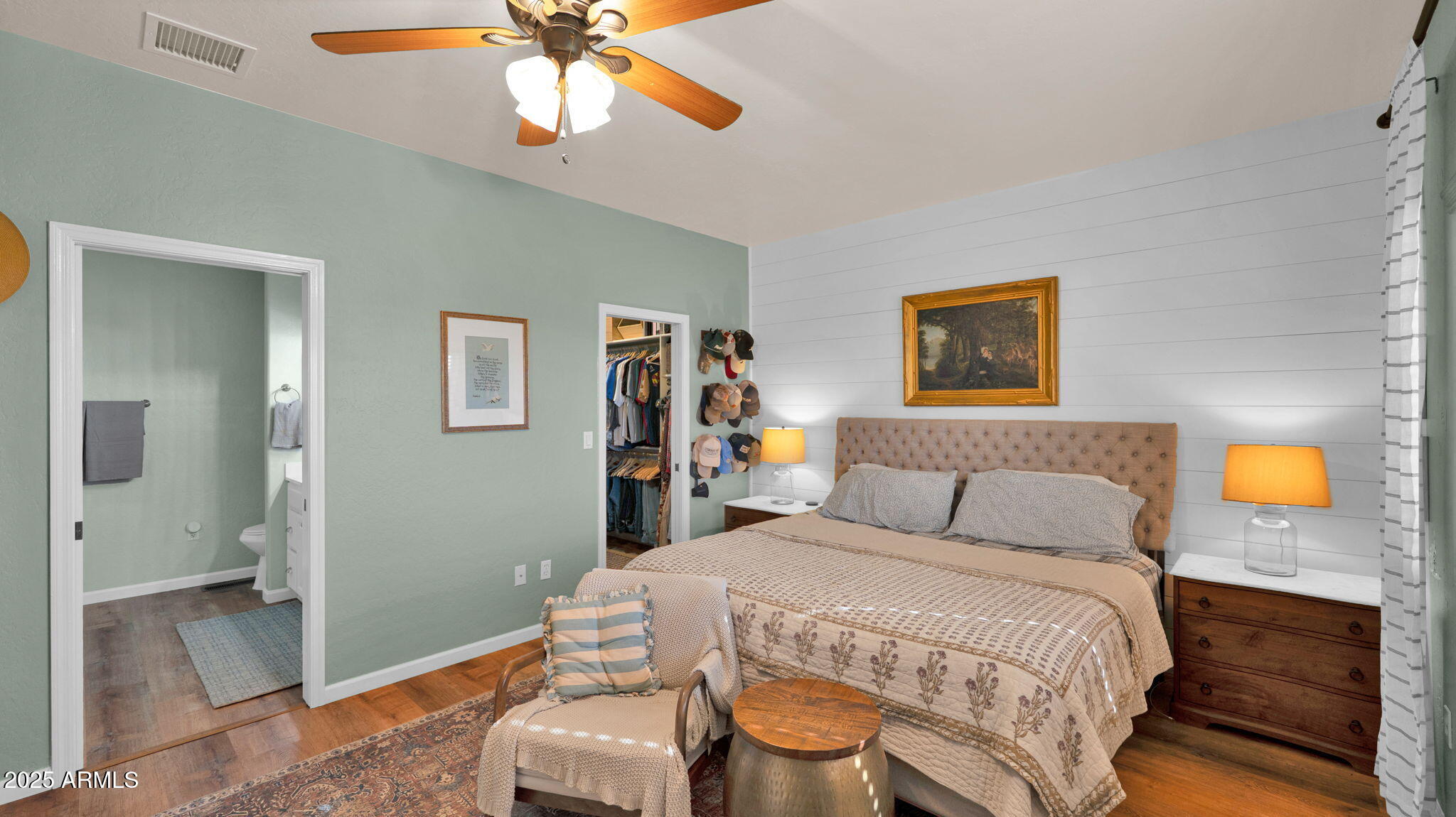 7645 Memory Lane Prescott Valley, AZ 86315 - Photo 66 of 79 a bedroom with a bed and a chandelier