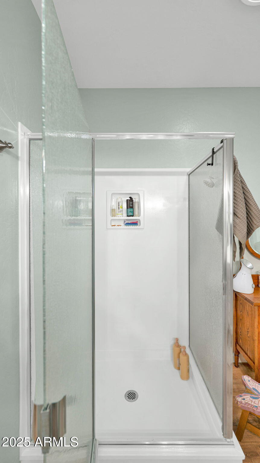 7645 Memory Lane Prescott Valley, AZ 86315 - Photo 69 of 79 a bathroom with a shower and a glass door