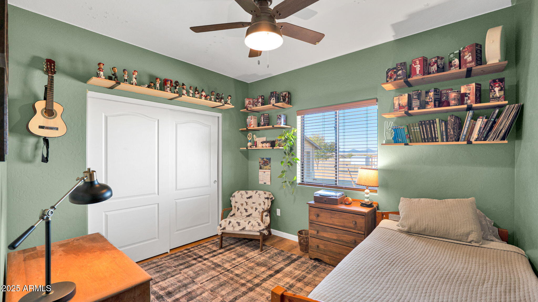 7645 Memory Lane Prescott Valley, AZ 86315 - Photo 72 of 79 a bedroom with furniture and a window