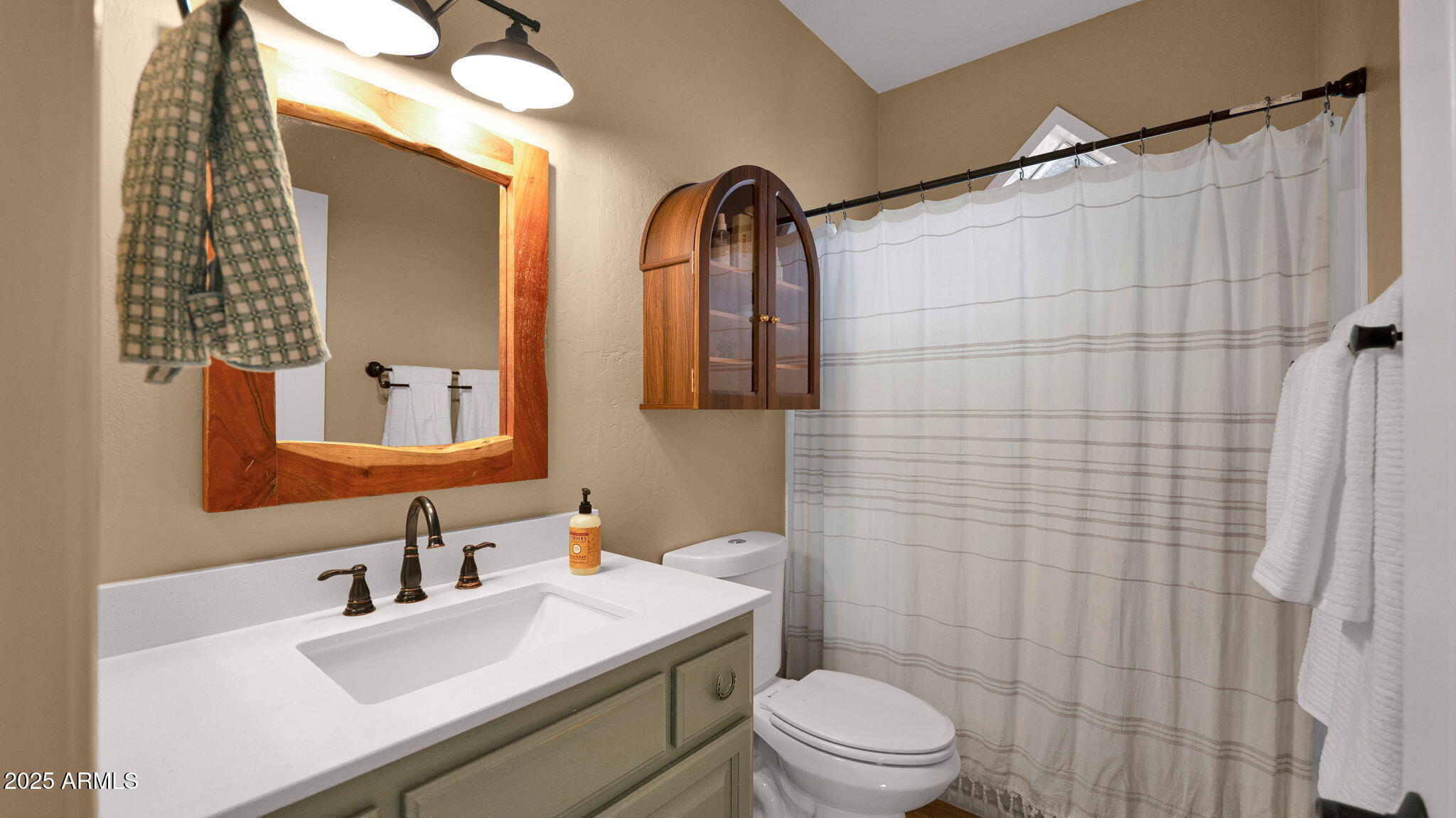 7645 Memory Lane Prescott Valley, AZ 86315 - Photo 75 of 79 a bathroom with a sink a toilet and shower