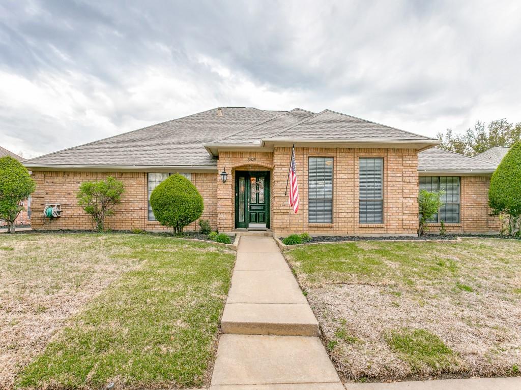 3829 Edgewater Drive Bedford, TX 76021 - Photo 1 of 1 a front view of a house with garden