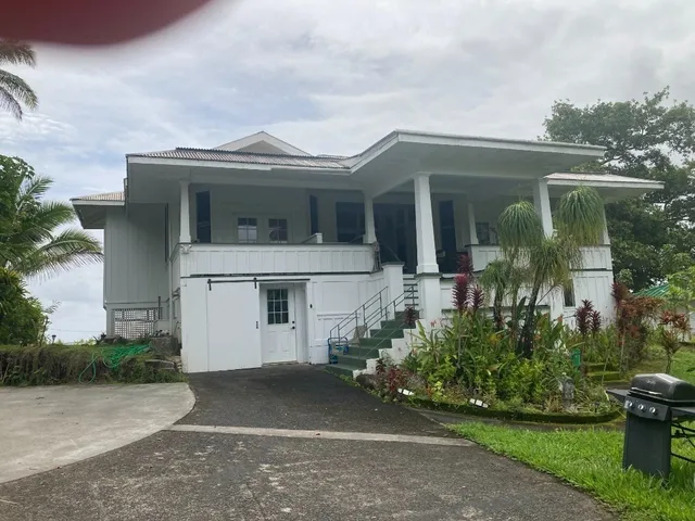 front view of a house with a street