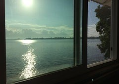 56 Pukihae Street Hilo, HI 96720 - Photo 3 of 6 a view of a lake from a balcony
