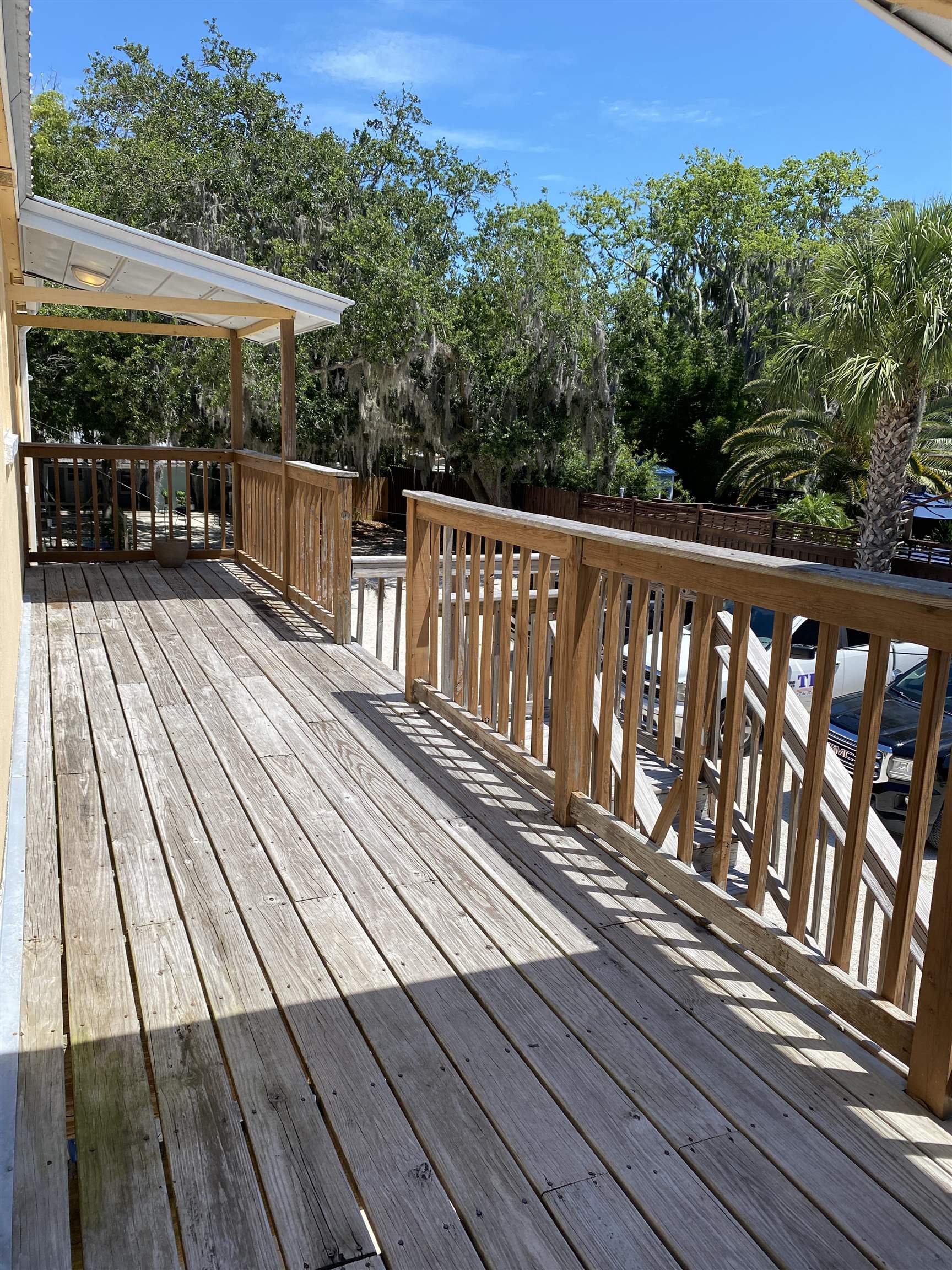 147 Riberia Street, Unit C St. Augustine, FL 32084 - Photo 14 of 23 a view of a wooden deck