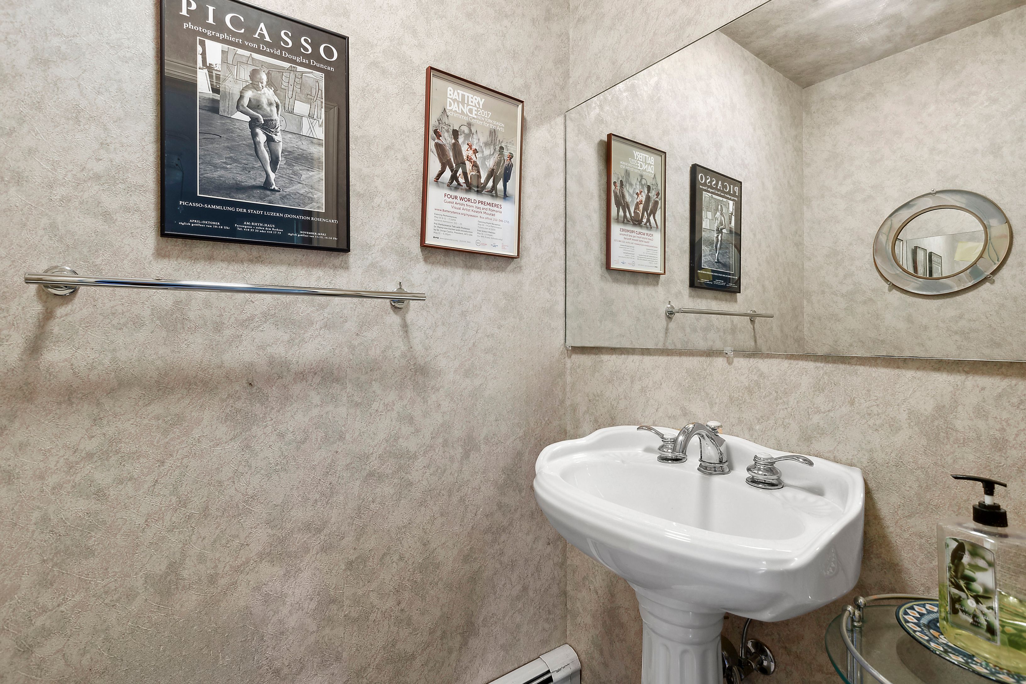 57 Wireless Road East Hampton, NY 11937 - Photo 12 of 27 a bathroom with a sink and a mirror