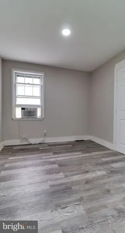 a view of a room that has a window in it
